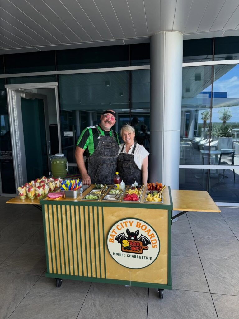 Brie and Corey with the cart at a corporate fruit cup event (SHI, 200 guests)